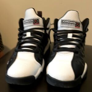 Big Kids black white leather/Varsity red. Jordan Jumpman. size 5y, like new.